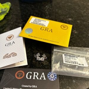 1 cart each pair of Moissanite studs with a bow on top